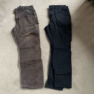 Two pairs of men carhartt pants